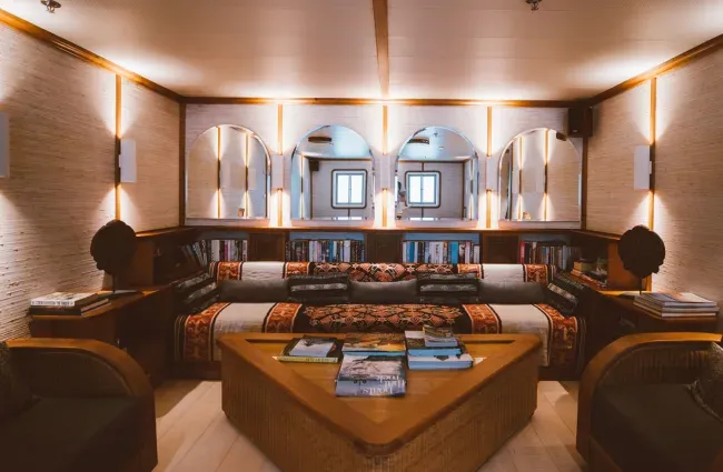 Main Library in Kudanil Explorer Cruise Liveaboard Yacht - KomodoLuxury